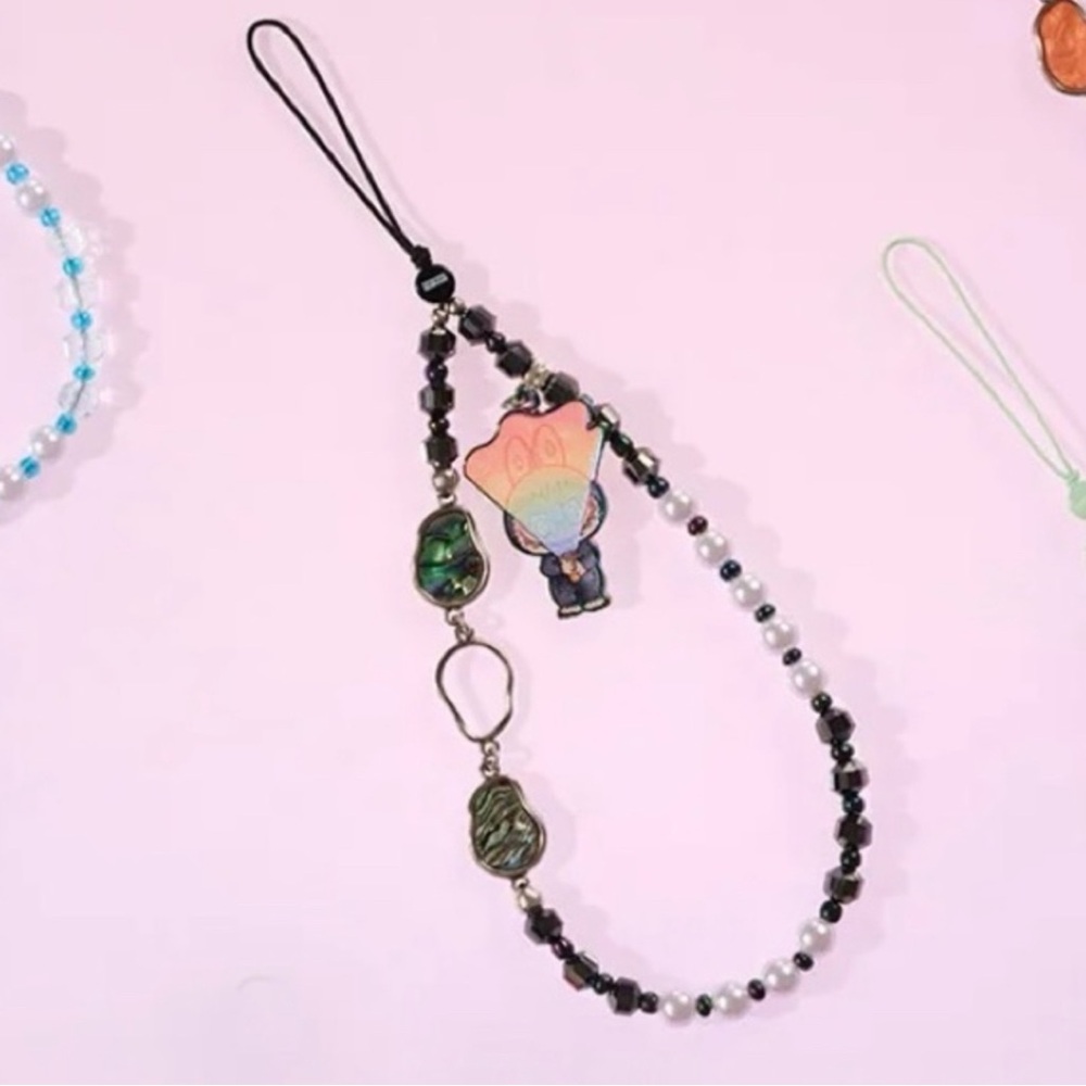 Big into Energy Secret ID phone charm